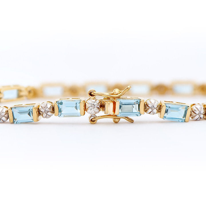 Plated 18KT Yellow Gold 11.30ctw Blue Topaz and Diamond Bracelet